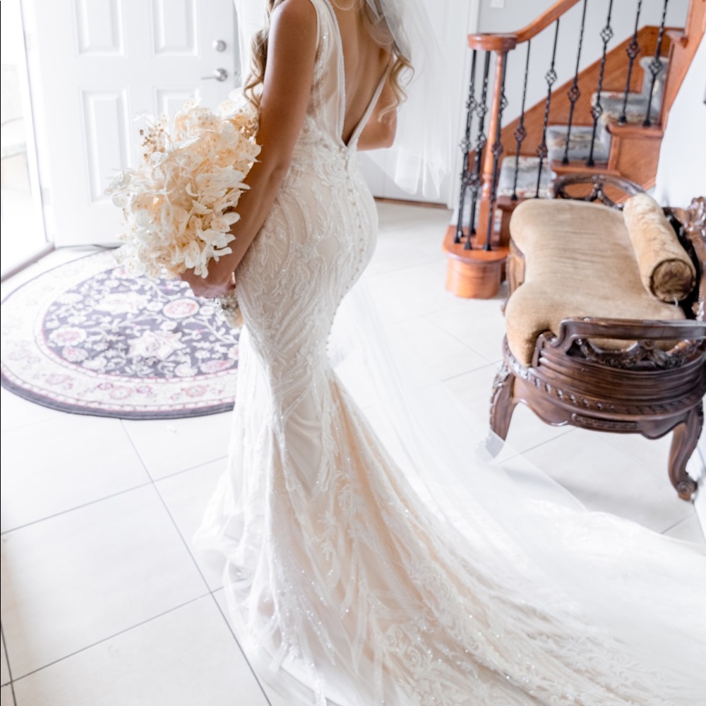 Katerina Bocci fitted with over British knitted skirt wedding dress